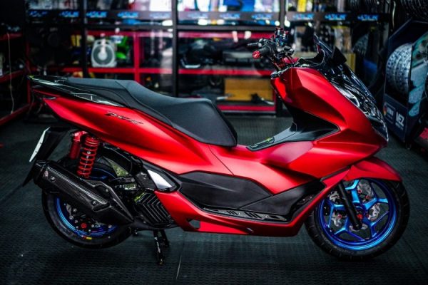 รถมอเตอร์ไซด์สีแดงยี่ห้อpcx